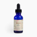 Blue dropper bottle with a label on a white background