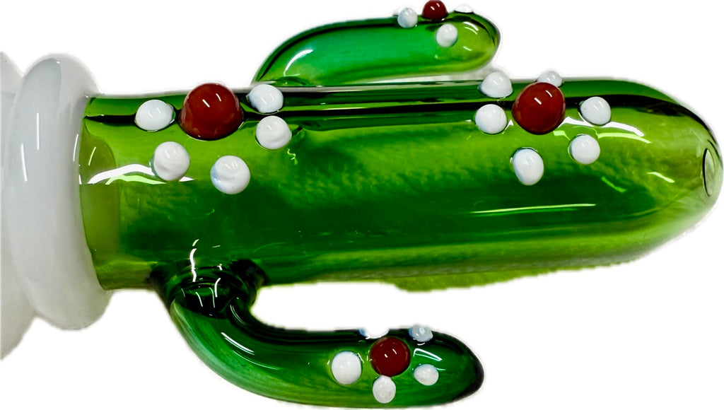 Close-up of Ripkitty 4.5" cactus glass spoon pipe — detailed view of green saguaro cactus body showing raised white dot nodules and red glass bead flower accents across all three arms, white background