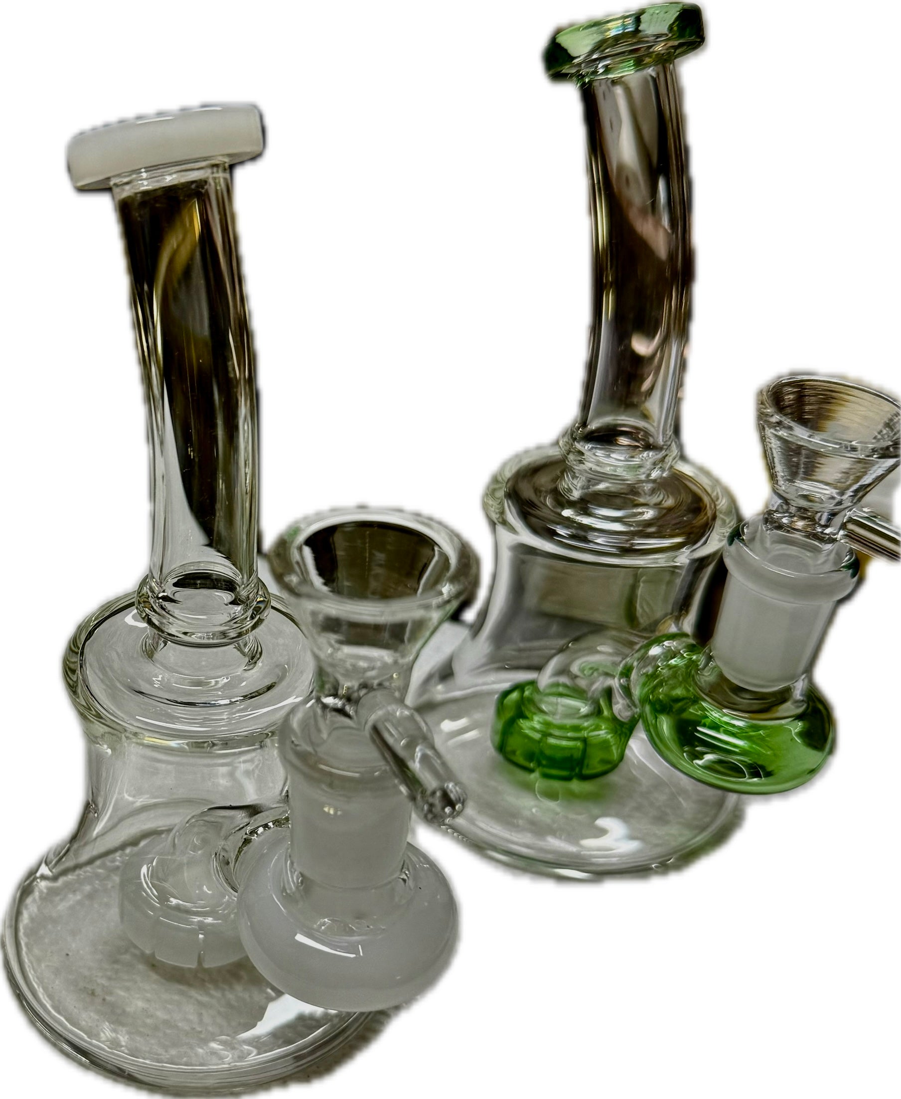 Two Ripkitty 7" conical bongs side by side — clear/white accent (left) and green accent (right), both with color shower necks, bowls removed, white background