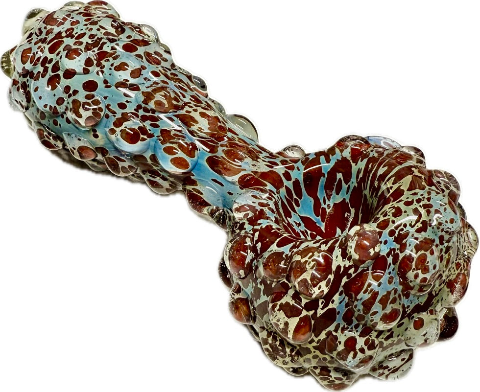 Ripkitty 5" blue spike spoon pipe — full side profile showing teal-blue and dark red frit pattern with raised spike nodules across entire body, white background