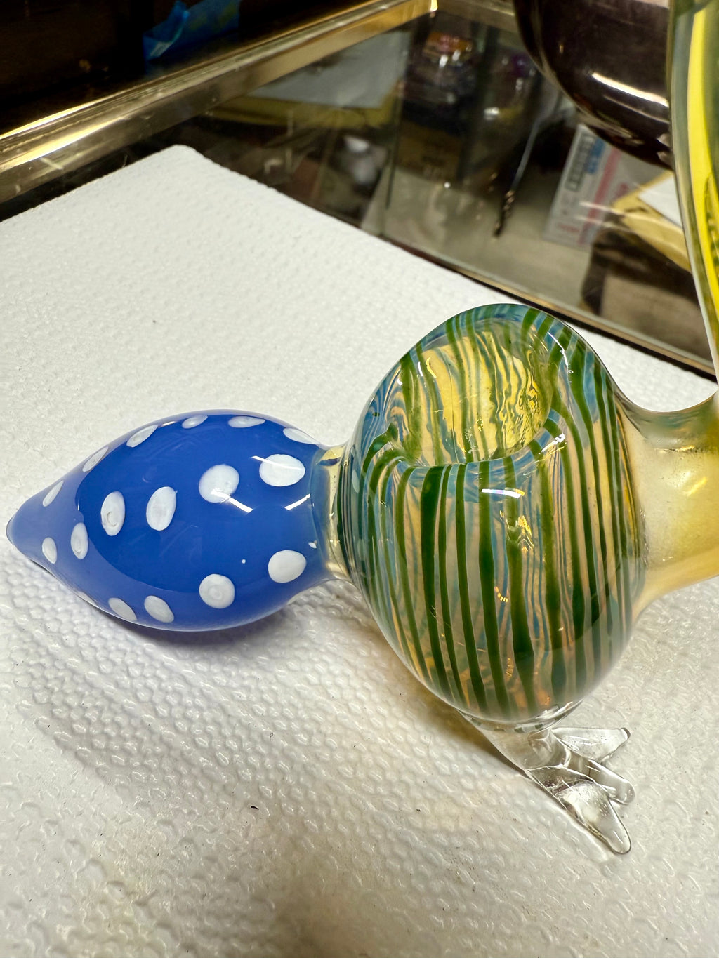 Ripkitty 5" peacock art pipe — alternate angle showing full peacock silhouette with teal-green stripe detailing and blue dot bowl, white background