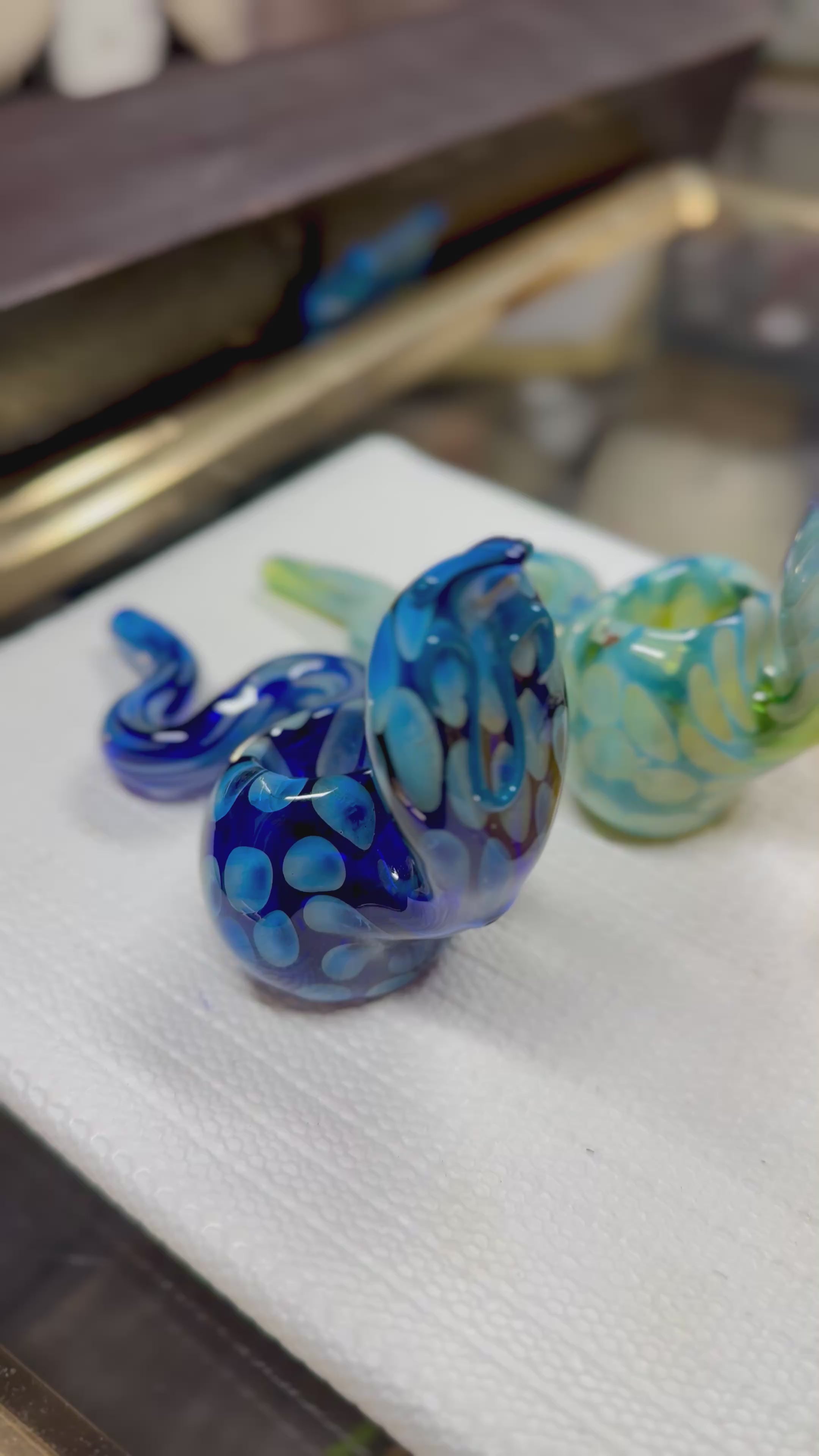 Ripkitty 5" COBRA borosilicate glass hand pipe — 360° display video showing cobra snake sculpt, coiled body, open bowl chamber, and assorted colorway detail